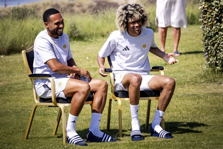 Curaçao's Kenji Gorre, left, and Tahith Chong answer questions from journalists in Noordwijk, Netherlands, on May 28.