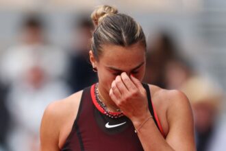 Aryna Sabalenka reacts after defeat to Diana Shnaider in their Women's Singles quarterfinal at the 2026 French Open on June 3.