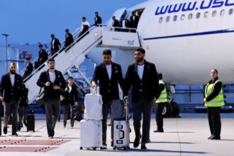 Members of the Iranian national soccer team arrive at Tijuana International Airport in Mexico on Sunday.