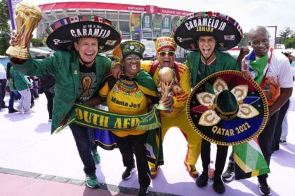 Soccer fans gather around Mexico City's Estadio Azteca on the eve of the World Cup opener between Mexico and South Africa.