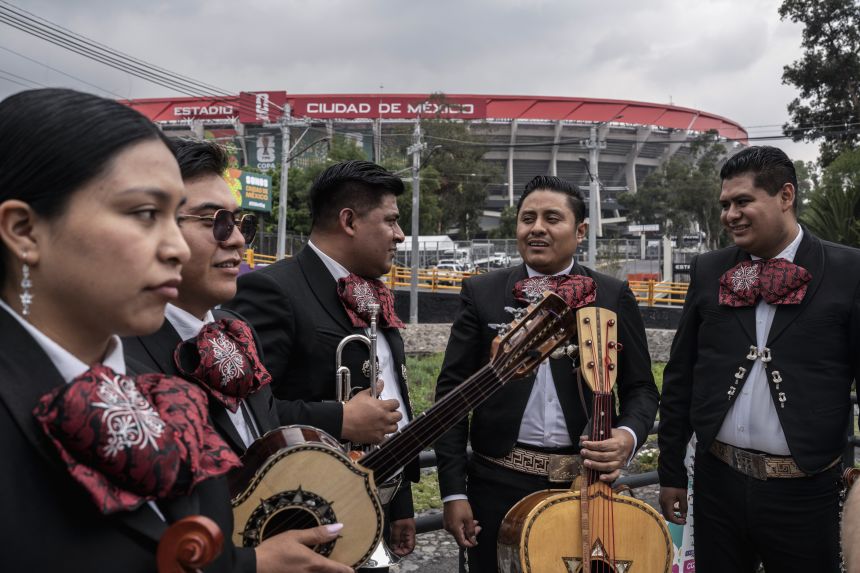 Mariachis gather outside the World Cup stadium in Mexico City on Wednesday.