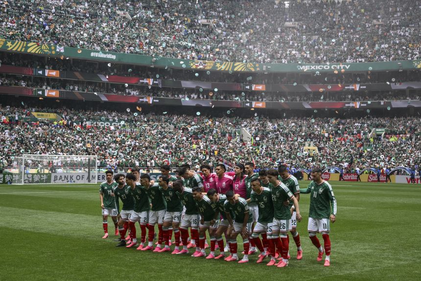 Mexico's team poses for a photo before the World Cup opener against South Africa.