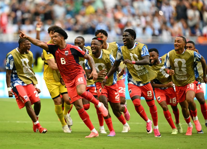 Cape Verde midfielder Kevin Pina celebrates after scoring his country's first ever World Cup goal.
