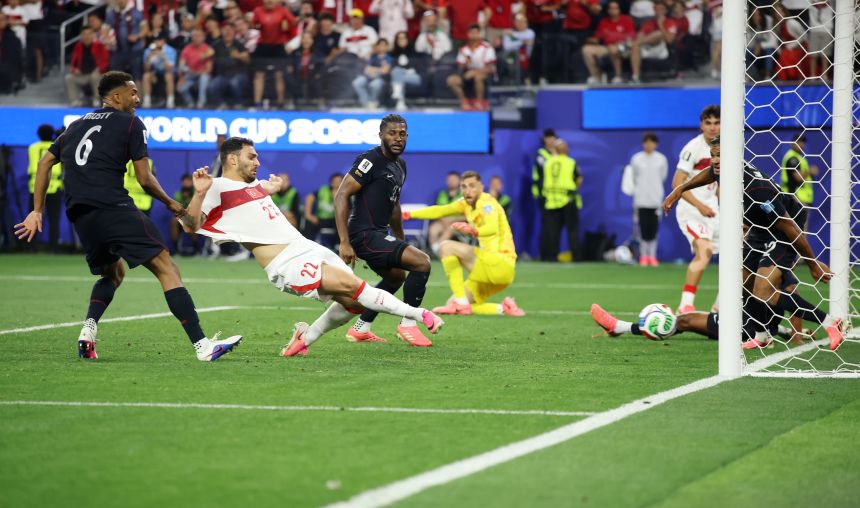 Turkey's Kaan Ayhan scores the winning goal late into second-half stoppage time.