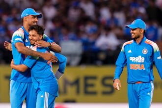 Harsh Dubey, centre, celebrates with Gurnoor Brar, left, and captain Shubman Gill after taking the wicket of Afghanistan's captain Hashmatullah Shahidi in the first ODI. (PTI Photo)