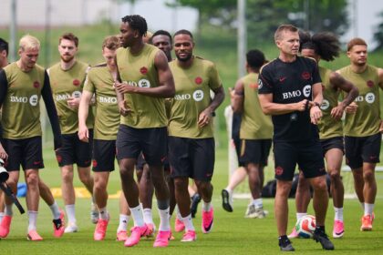 Canada's head coach Jesse Marsch, right, leads his players during a World Cup soccer training session in Toronto, Tuesday, June 9, 2026. (Sammy Kogan/The Canadian Press via AP)