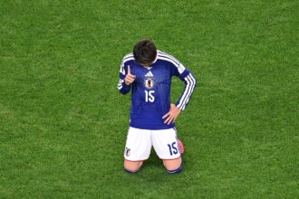 Japan's Daichi Kamada points to the sky after the World Cup Group F match against the Netherlands. (AP Photo)