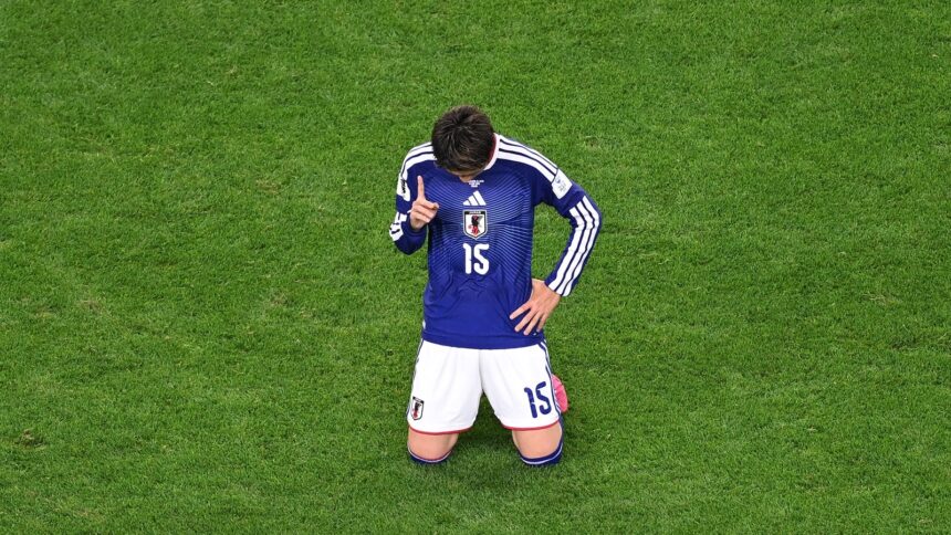 Japan's Daichi Kamada points to the sky after the World Cup Group F match against the Netherlands. (AP Photo)