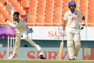 Manav Suthar bowls vs Afghanistan at Mullanpur on Sunday. (Express Photo | Kamleshwar Singh)