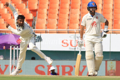 Manav Suthar bowls vs Afghanistan at Mullanpur on Sunday. (Express Photo | Kamleshwar Singh)