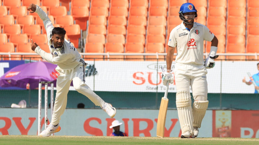 Manav Suthar bowls vs Afghanistan at Mullanpur on Sunday. (Express Photo | Kamleshwar Singh)