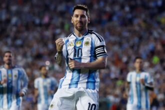 Lionel Messi celebrates his goal on a free kick during the international friendly match against Iceland. (AP)
