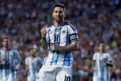Lionel Messi celebrates his goal on a free kick during the international friendly match against Iceland. (AP)