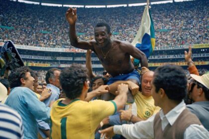 Pelé is hoisted on the shoulders of his teammates after Brazil won the 1970 World Cup soccer final against Italy, 4-1, in Mexico City’s Estadio Azteca. (AP)