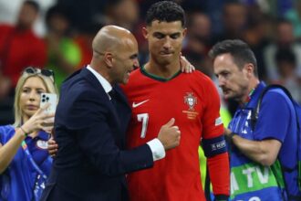 Portugal coach Roberto Martinez with Cristiano Ronaldo. (Reuters)