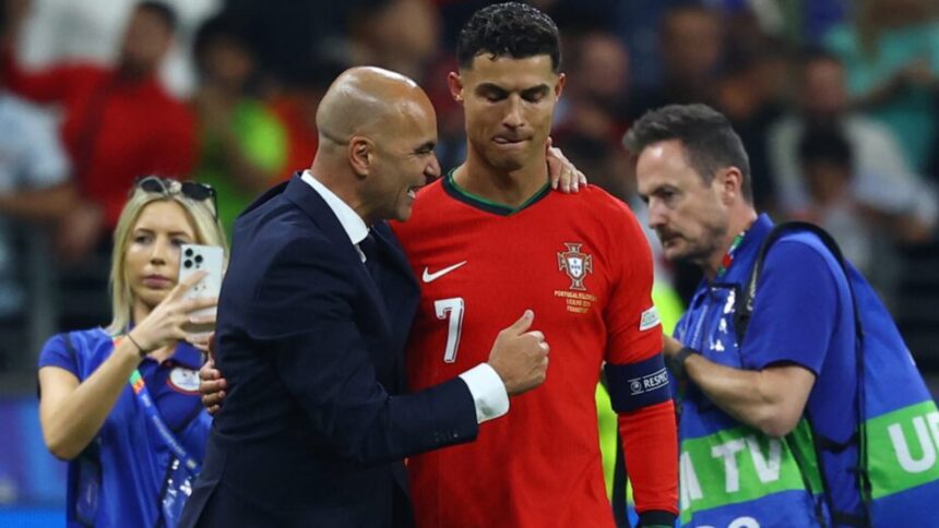 Portugal coach Roberto Martinez with Cristiano Ronaldo. (Reuters)