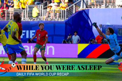 Morocco goalkeeper Yassine Bounou, right, fails to stop a shot from Brazil's Vinicius Junior who scores his side first goal during the World Cup Group C soccer match between Brazil and Morocco in East Rutherford, N.J., near New York, Saturday, June 13, 2026. (AP Photo)