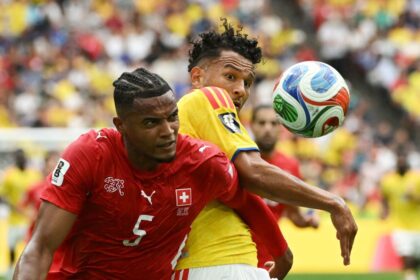 Switzerland's Manuel Akanji and Colombia's Luis Suarez battle for the ball on Tuesday.