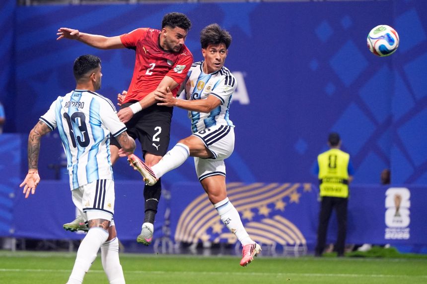 Egypt's Yasser Ibrahim scores his side's opening goal against Argentina.