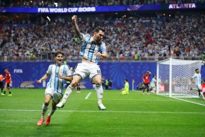 Argentina's Lionel Messi celebrates scoring their second goal.