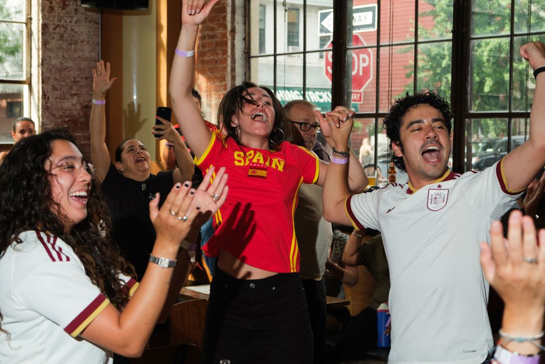 Fans celebrate Spain’s win over Belgium.