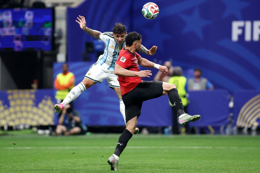Argentina's Enzo Fernandez soars to score the winning goal.