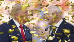 President Donald Trump, left, speaks with FIFA President Gianni Infantino as confetti falls after the conclusion of the 2026 World Cup final.