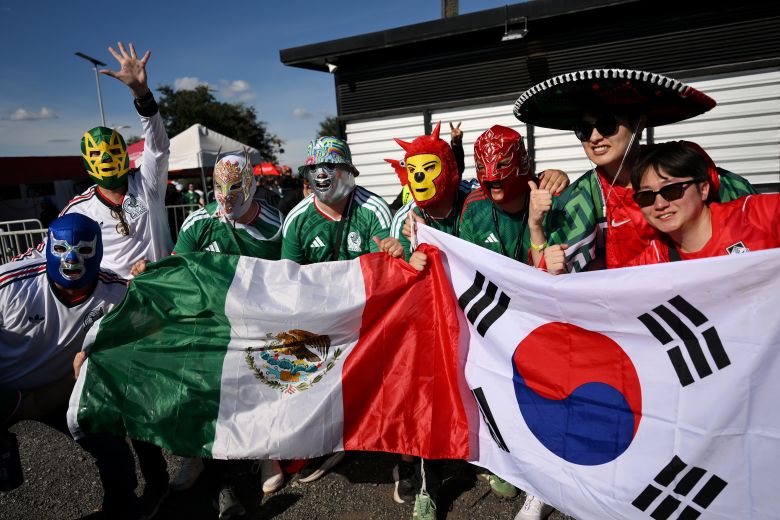 Fans of Mexico and South Korea enjoy the prematch atmosphere before a group-stage match in Zapopan, Mexico, last month.