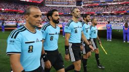 INGLEWOOD, CALIFORNIA - JUNE 25: Referee Mustapha Ghorbal and match officials line up before the FIFA World Cup 2026 Group D match between Türkiye and USA at Los Angeles Stadium on June 25, 2026 in Inglewood, California. (Photo by Emilee Chinn/Getty Images)