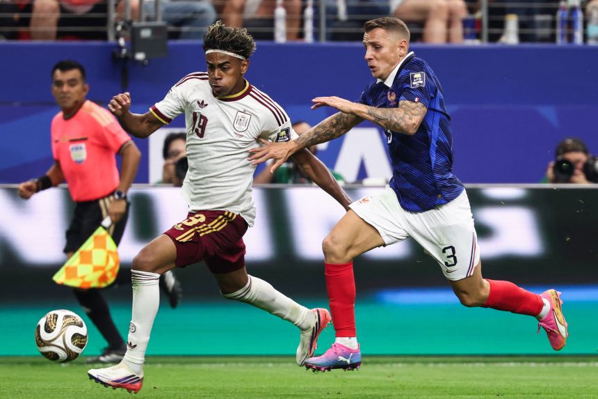 Spain's Lamine Yamal, left, and France's Lucas Digne compete for the ball during the World Cup semifinal on July 14. European teams made up three of the four teams in this year's semifinals.