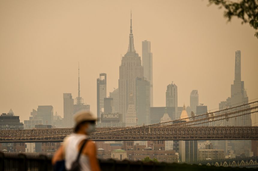 Smoke from wildfires is seen over New York City in the buildup to the World Cup final.