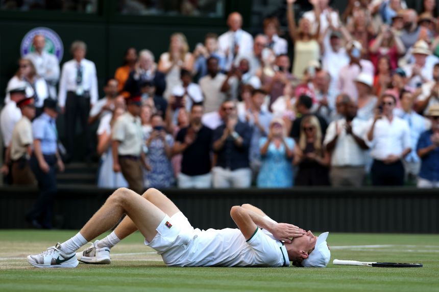 Jannik Sinner of Italy celebrates winning championship point against Alexander Zverev of Germany.
