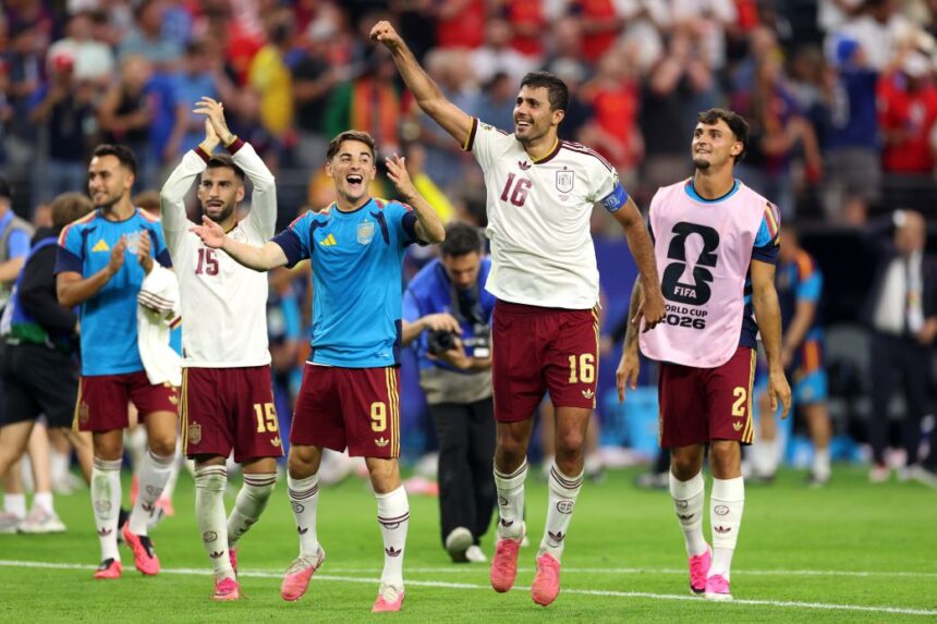 Spanish players celebrate Tuesday after booking a spot in the World Cup final.
