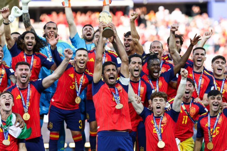 Spanish captain Rodri lifts the World Cup trophy after the victory.