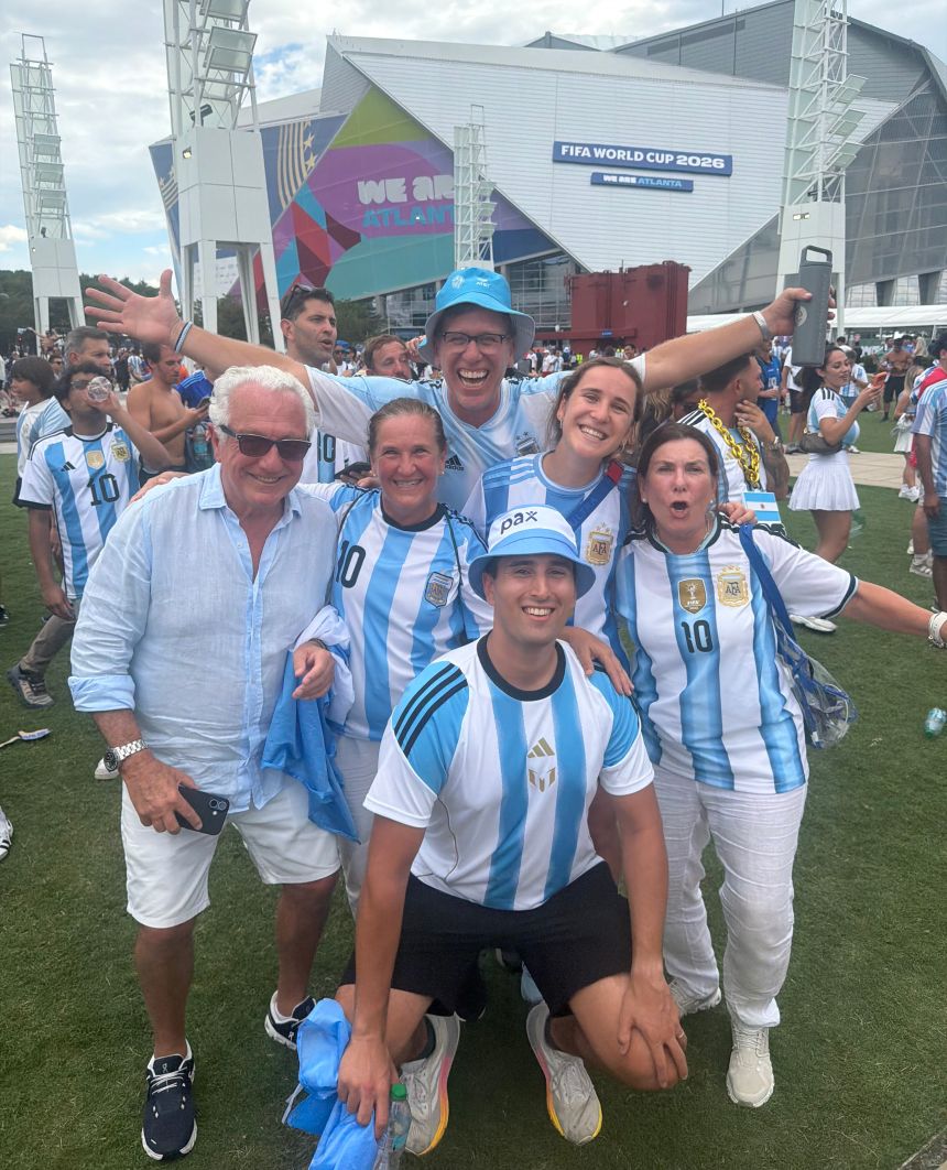 Argentina fan and CNNI Global Productions senior producer Robert Howell (top of the group) enjoyed the <em>Albiceleste's</em> magical run to the final.