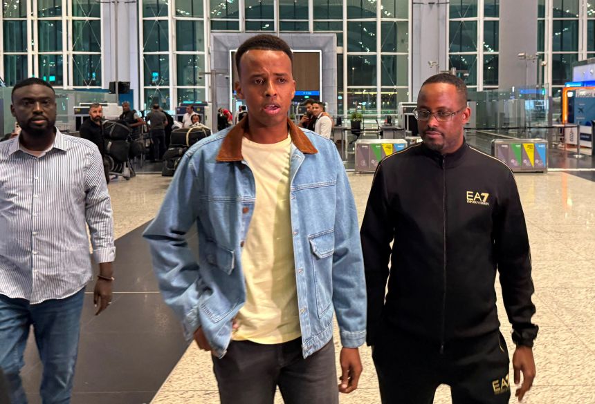 Artan speaks to the media at Istanbul Airport in June after being denied entry into the United States.