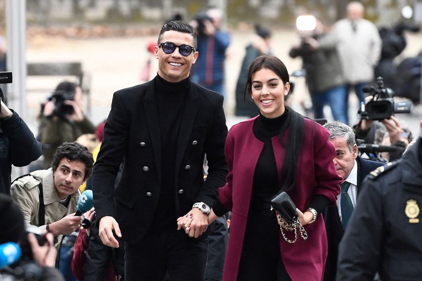Cristiano Ronaldo (left) and Georgina Rodriguez (right) are pictured in Madrid in 2019.