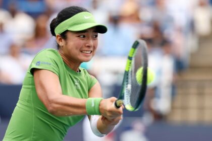 Alexandra Eala of the Philippines returns a shot during the women's singles championship match against Jessica Pegula in Washington, DC. (Photo by Emilee Chinn/Getty Images)