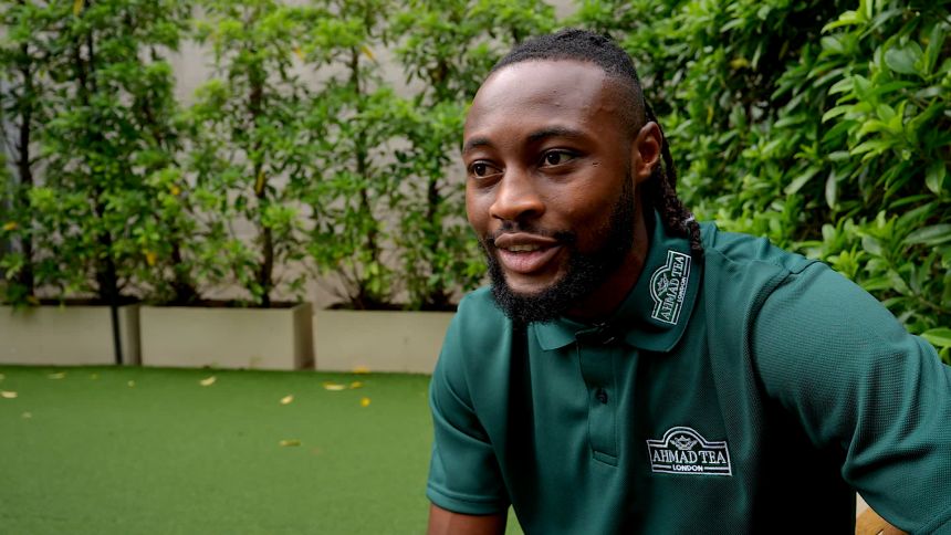 Antoine Semenyo sits down for a CNN Sports interview in Hong Kong.